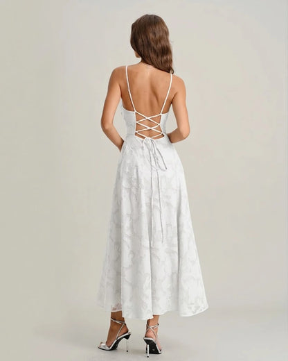 Vestido largo tipo slip con estampado jacquard y espalda cruzada